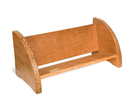 Robert 'Mouseman' Thompson (1876-1955), an oak book trough,  the curved side support carved with mouse signature20 x 46 x 21c