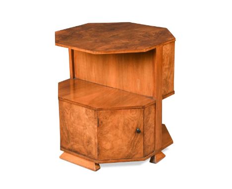 A Heal's asymmetric walnut side table / cabinet, circa 1930,  the octagonal top above single cupboard and open shelf to eithe