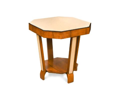 An Art Deco period walnut and peach glass occasional table, the bevelled peach-glass top with matching mirrored panels to the