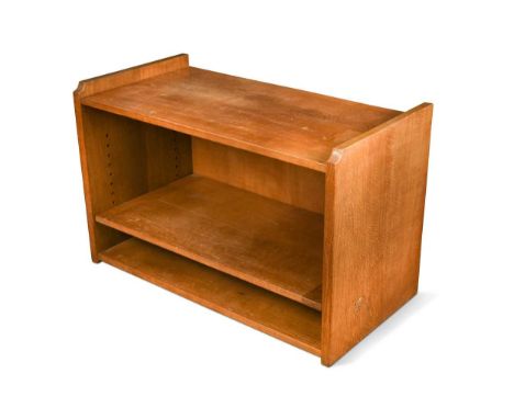 Robert 'Mouseman' Thompson, an oak TV stand,  of rectangular form with single adjustable shelf, carved mouse signature to sid