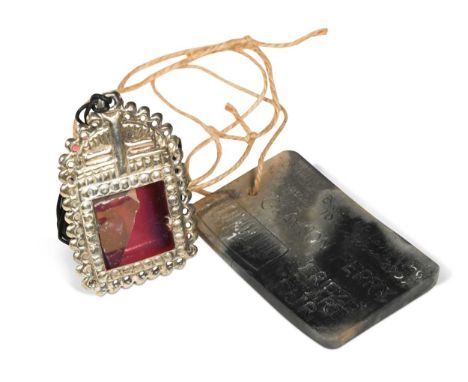 § Grayson Perry CBE, RA (1960-), Reliquary, 2009, a ceramic fragment in incised metal pendant produced by the artist for the 