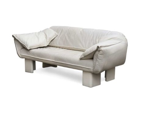 A Danish cream leather two-seat sofa, raised on four right-angled supports75 x 180 x 90cmThis lot has been imported from outs