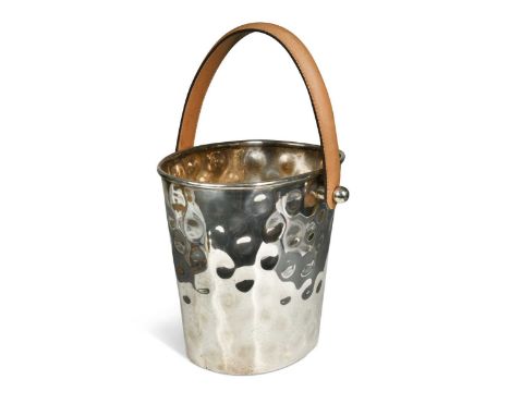 A contemporary silver-plated ice bucket, the 'dimpled' body with a pale tan leather loop handle38 x 26cmExcellent condition w