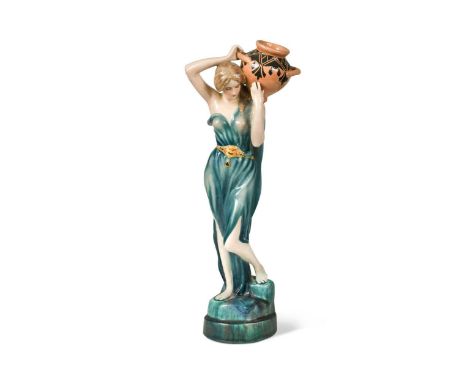 A Goldscheider pottery figurine of a classical maiden, naturalistically modelled as a water carrier standing atop a marbled s