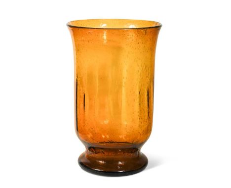 In the manner of Whitefriars, a large amber glass hurricane lamp,  the bubble included vase with flared rim38.5cm high