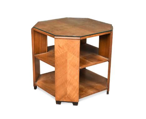 A Heal's Art Deco walnut book table,  of canted square form with rectangular upright supports and ebonised stepped feet, ivor