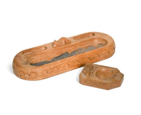 Robert 'Mouseman' Thompson (1876-1955), an oak pen tray and an oak ashtray, each carved in relief with a singular mousethe pe