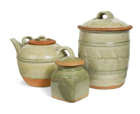 § Richard Batterham (1936-), an oversized stoneware teapot and cover, the twin-handled body partially covered in a green ash 