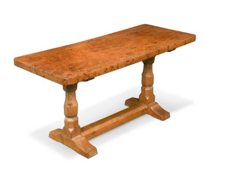 Robert 'Mouseman' Thompson, a burr oak topped coffee table,  the rectangular top on twin octagonal baluster supports and slei