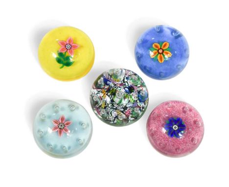 Five Paul Ysart glass paperweights, one of harlequin design with a central tear bubble surrounded by a ring of eight further 
