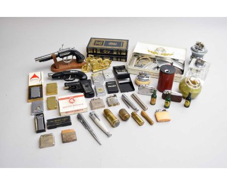 A collection of Zippo, Ronson and other lighters and accessories including: ten standard and three slimline Zippo lighters; a