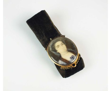 An 18th/early 19th century portrait miniature bracelet, the oval portrait mounted in yellow metal, with engraved monogram to 