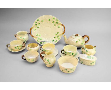 A group of Belleek 'Shamrock' tea and decorative wares, 2nd and 3rd Periodscomprising a teapot and cover, four teacups, four 