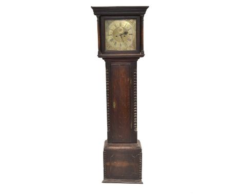 A 19th century oak, 8-day longcase clock, the plain hood with a shaped cornice and enclosing an earlier 12" brass dial, signe