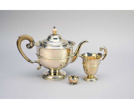 An Edwardian silver pedestal teapot and milk jug, Harrison Brothers &amp; Howson, Sheffield 1907, teapot measures approx 18.5