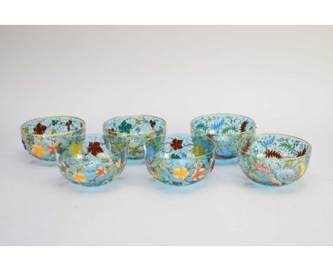 A set of six Victorian Continental enamelled glass finger bowls, decorated with multi-coloured leaves and berries with gilt l
