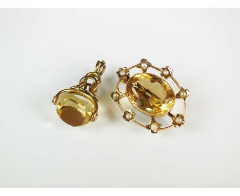 A citrine and split pearl brooch, set in yellow metal, not stamped, together with a citrine set swivel fob, total weight appr