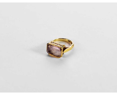 A 9ct gold amethyst dress ring, the trap cut amethyst collet set in gold, ring size M, weight approx 5.1gCondition report: So