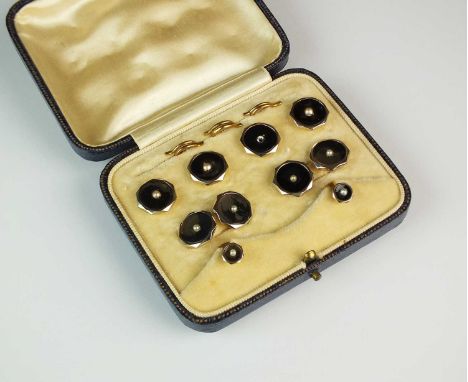 A cased set of split seed pearl set dress studs and cufflinks, each stamped '18ct 9ct', total weight approx 13.5g (at fault)