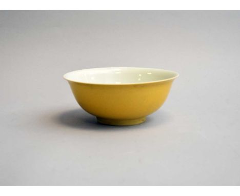 A Chinese yellow ground dragon bowl, six-character Hongzhi mark but later, of inverted bell form, the outside decorated with 