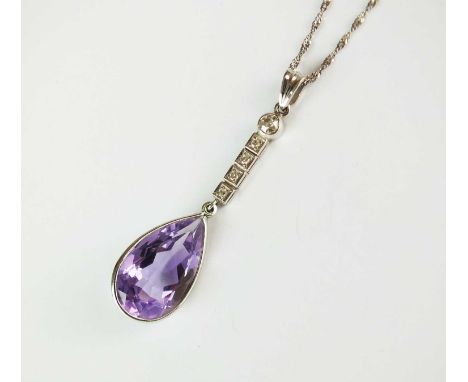 A 9ct white gold amethyst and diamond pendant, designed as a pear cut amethyst mounted to brilliant cut diamond set bar and s