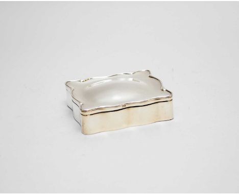 An Edwardian silver mounted jewellery box, A &amp; J Zimmerman Ltd, Birmingham 1907, of shaped rectangular form with lined in