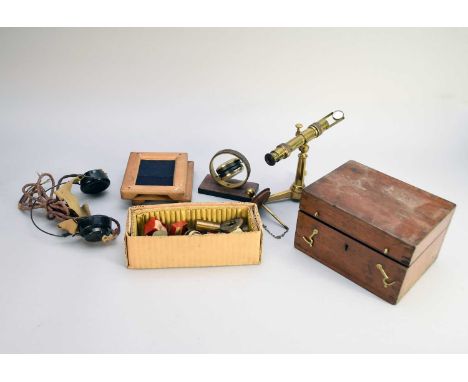 Including a brass tripod scope, a set of polarimeter glass tubes, two wood instrument cases, a selection of brass fittings in