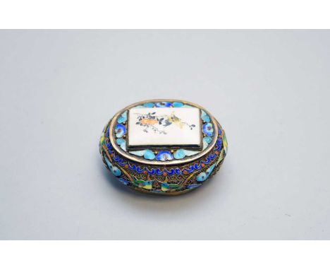 A Chinese enamel, gilt and ivory inlaid box and cover, circa 1900, of ovoid form, the cover inset with a bone rectangular tab