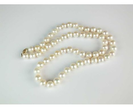 A single strand uniform cultured pearl necklace, the yellow metal clasp stamped '10k', pearls each measure approx 10mm, lengt