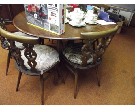 Ercol table with 6 chairs 