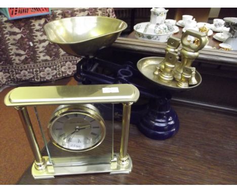 Set of balance scales together with a mantel clock 