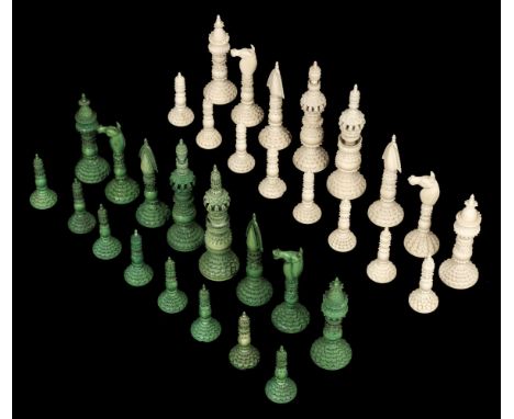 * Chess. An Anglo-Indian ivory Vizagapatam 'Pepys' chess set circa 1820, comprising 32 pieces, one side stained green, the ot