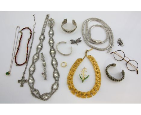 Collection of mainly costume jewellery, including amber bead and shell necklace, two Egyptian silver cuffs, white metal bangl