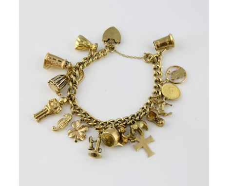 Vintage curb link charm bracelet, with heart clasp, hallmarked London 1978, measuring approximately 17.5cm in length, with se