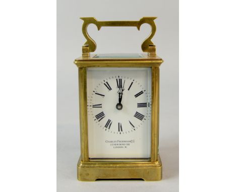 Brass and glass carriage clock by Charles Frodsham, London  14 cm 