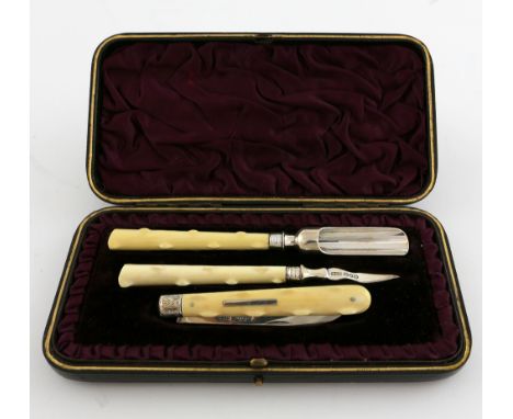 Victorian silver and ivory handled three piece fruit set, comprising corer, pip pick and folding knife, by Hilliard & Thomaso