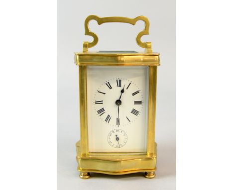Brass and glass carriage clock with lever escapement and alarm striking on a bell   17 cm 