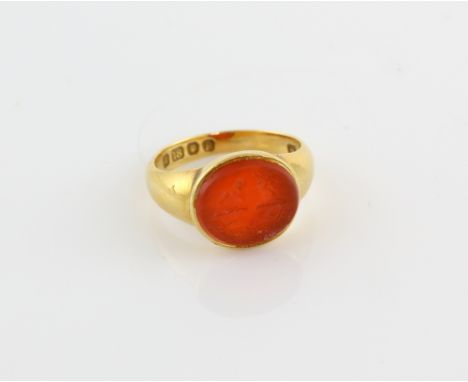 Carnelian intaglio signet ring, mounted in 18 ct, hallmarked London, ring size O.   Gross weight 6.7 grams