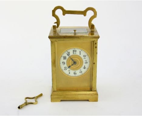 French brass carriage clock, the repeating movement striking on a gong, 18cm high