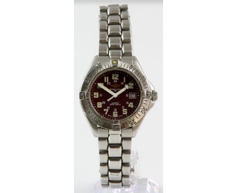 A  Breitling Colt A57035 watch with red Arabic signed dial, white minute track and hands,  date aperture at 3, surrounded by 
