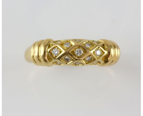 Cartier dress ring, set with thirteen round brilliant cut diamonds, mounted in diamond pattern, with banded shoulders, estima