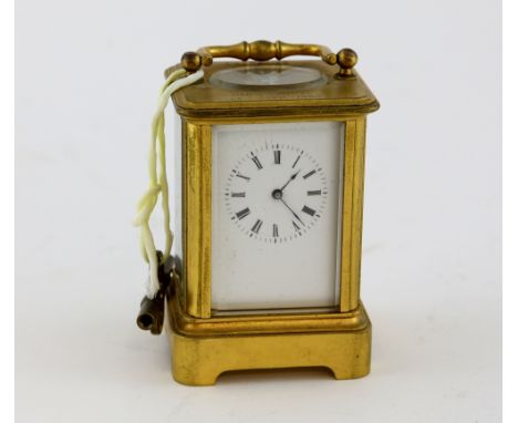 Miniature brass carriage clock inscribed La Petite Nee a Geneve, le 7 Avril 1869, 9.5cm x 5cm x 4.5cm,