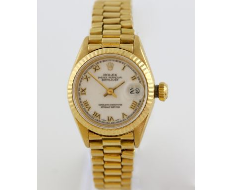 Rolex Datejust ladies wristwatch,  the signed  white dial with applied gold roman numerals, date at 3, the case with fluted b