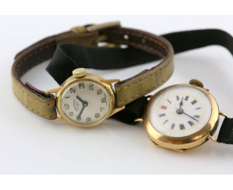 1940's lady's gold wristwatch, white enamel dial with Roman numerals, mechanical movement, in 15 ct yellow gold case, with Lo
