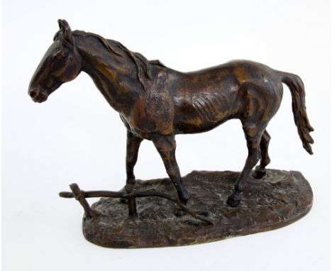 Apul Edouard D, a bronze figure of a horse beside a low fence on a naturalistic cast base, 23cm high x 33cm wide.   