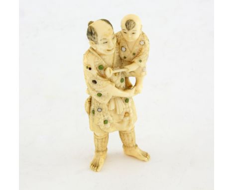 19th Century Japanese ivory figure of a man carrying a child, 9 cm,PLEASE NOTE: THIS ITEM CONTAINS OR IS MADE OF IVORY. Buyer