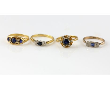 Four sapphire and diamond rings, Edwardian ring, set with three round cut sapphire and four old cut diamonds, size M, a three