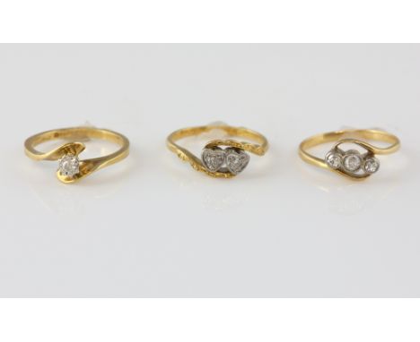 Three diamond set rings, Edwardian three stone twist ring, set with old cut diamond, mounted in yellow metal stamped 18 ct, s