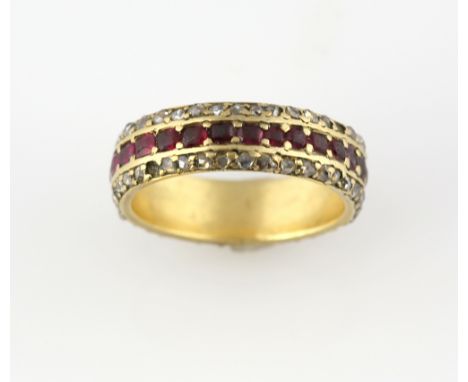 Ruby and diamond full eternity ring, set with rectangular cut rubies set in between two bands of rose cut diamonds, mounted i