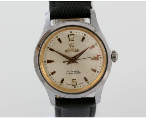 A Roamer Wristwatch the signed guilloche engine turned dial with stylised numerals at 12 and 6, baton hour markers, centre se
